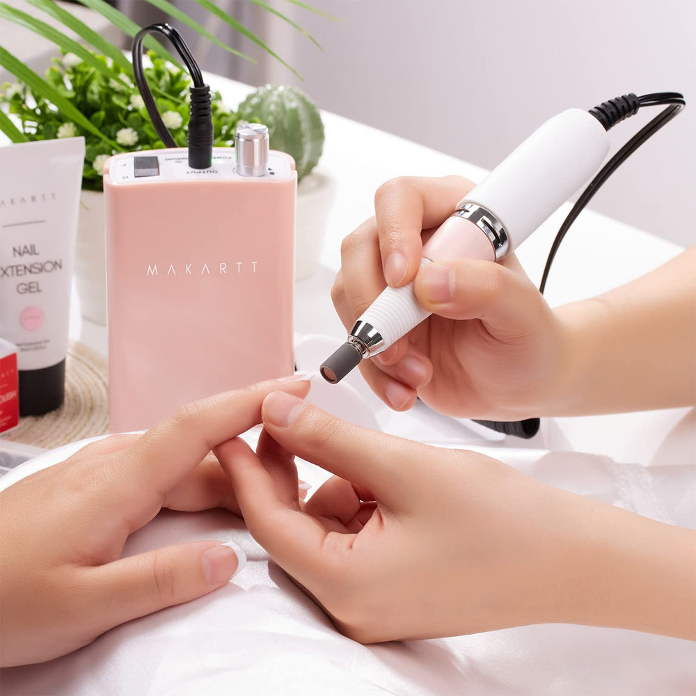 Makartt Malory pink nail drill in action removing gel and tips