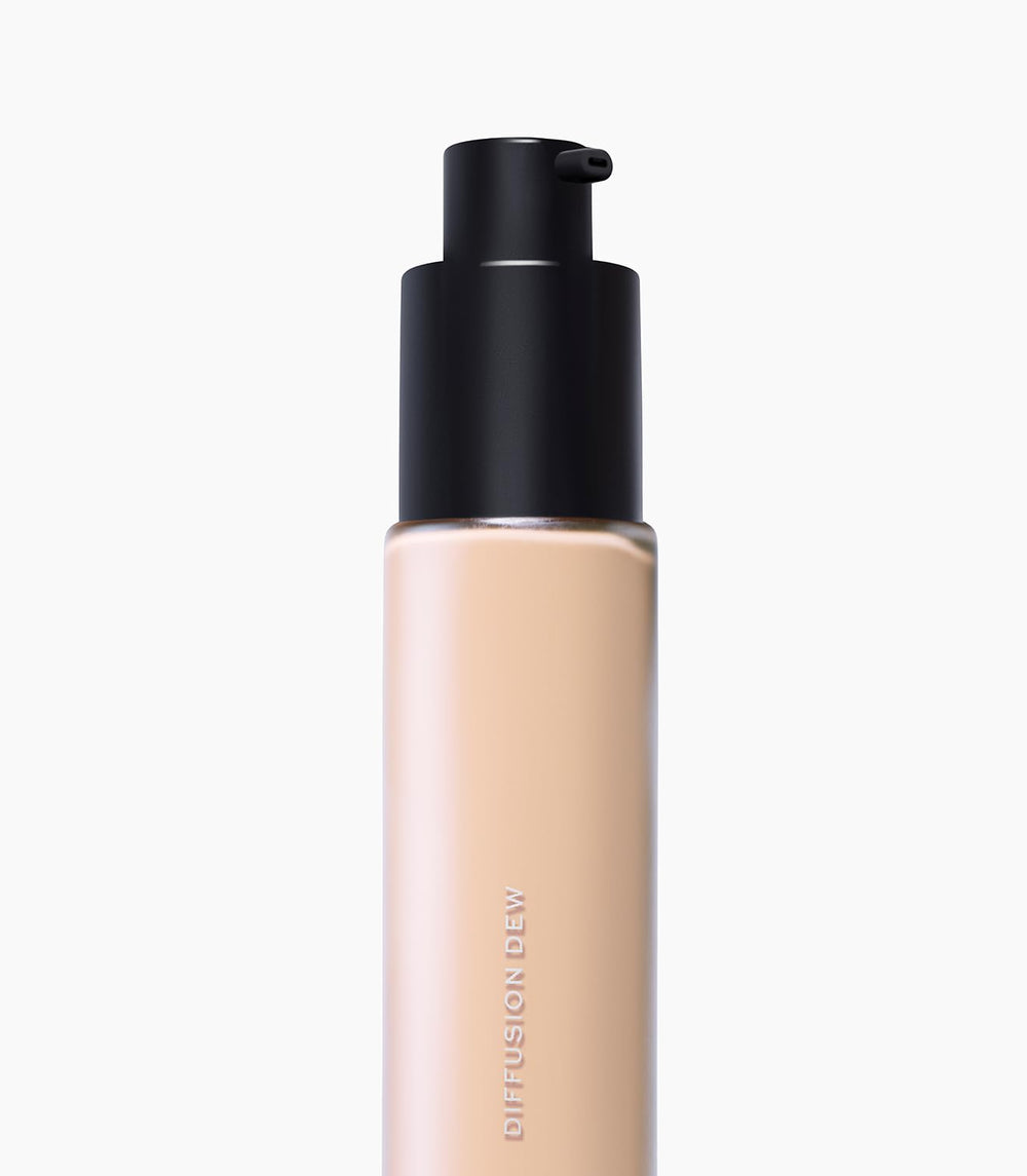 MAKE Diffusion Dew Skin Tint swatch on skin demonstrates sheer-to-medium coverage.