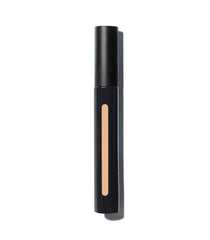 MAKE Beauty Skin Mimetic Concealer under-eye area being touched for a bright, rested look