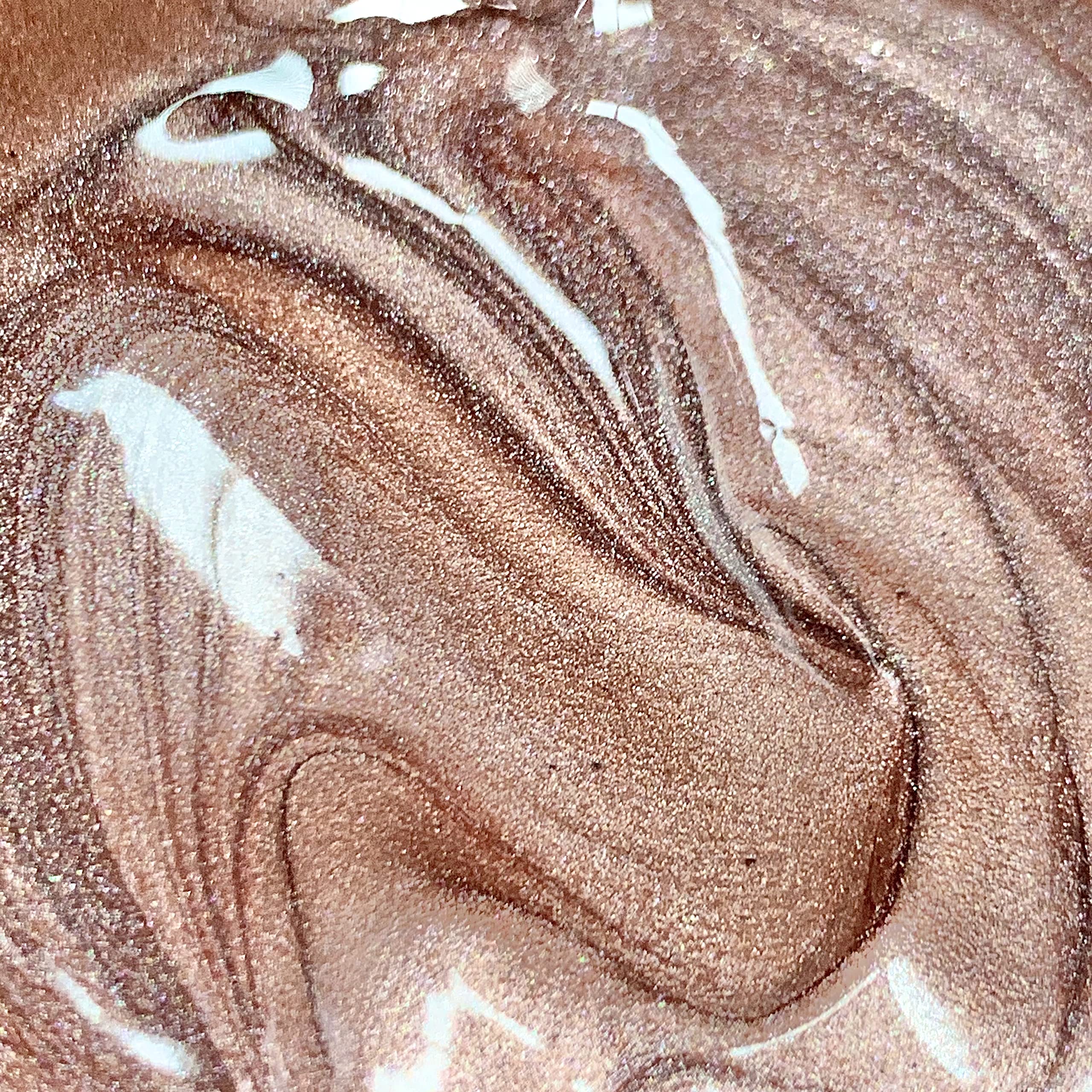 Makeup Revolution Molten Body Glow Rose Gold arms and legs glow evenly