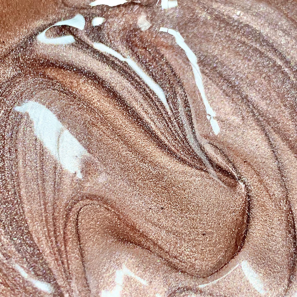 Makeup Revolution Molten Body Glow Rose Gold arms and legs glow evenly