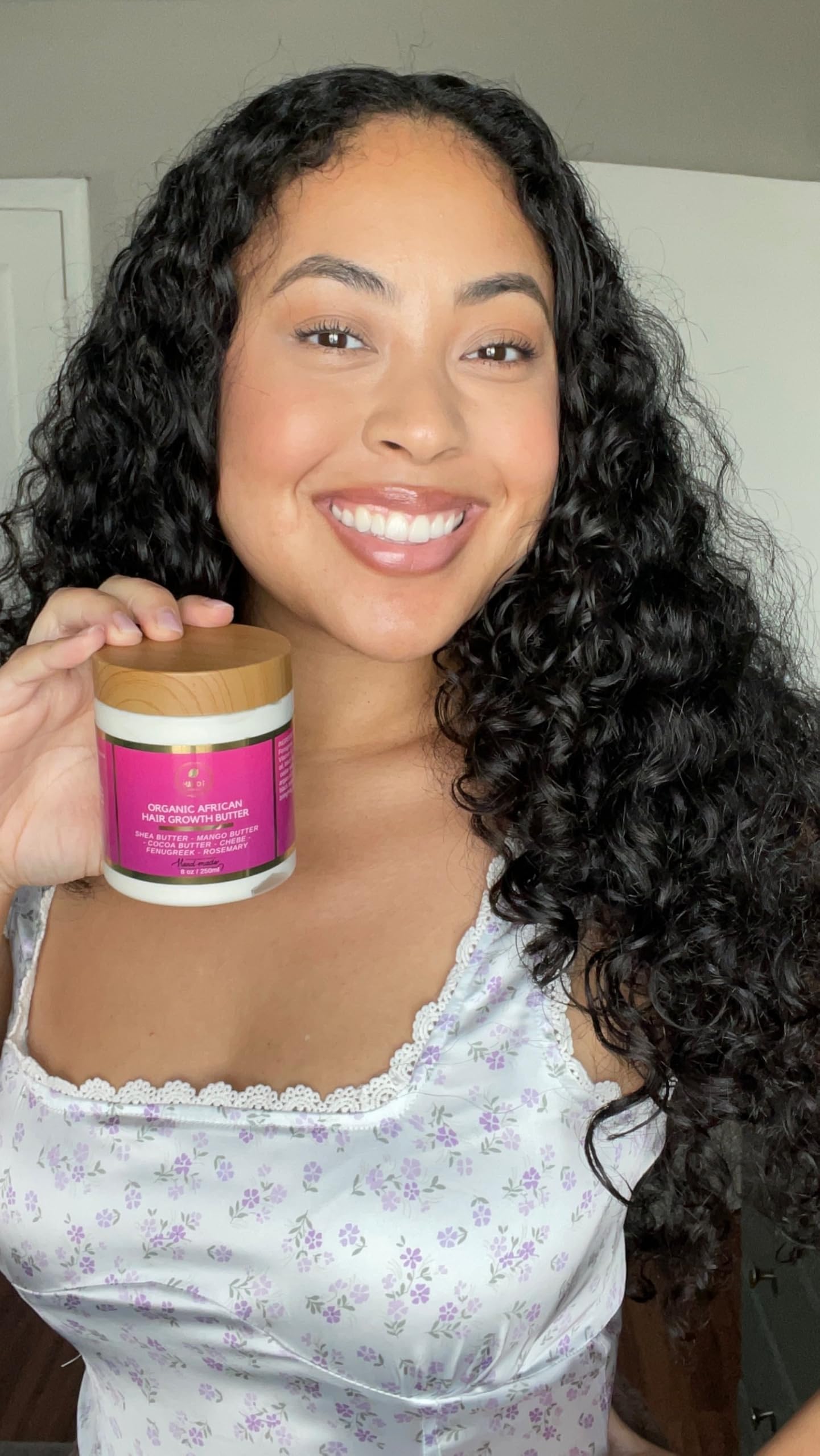 MAKOF BEAUTY Chebe butter in bun shows thicker-looking hair potential