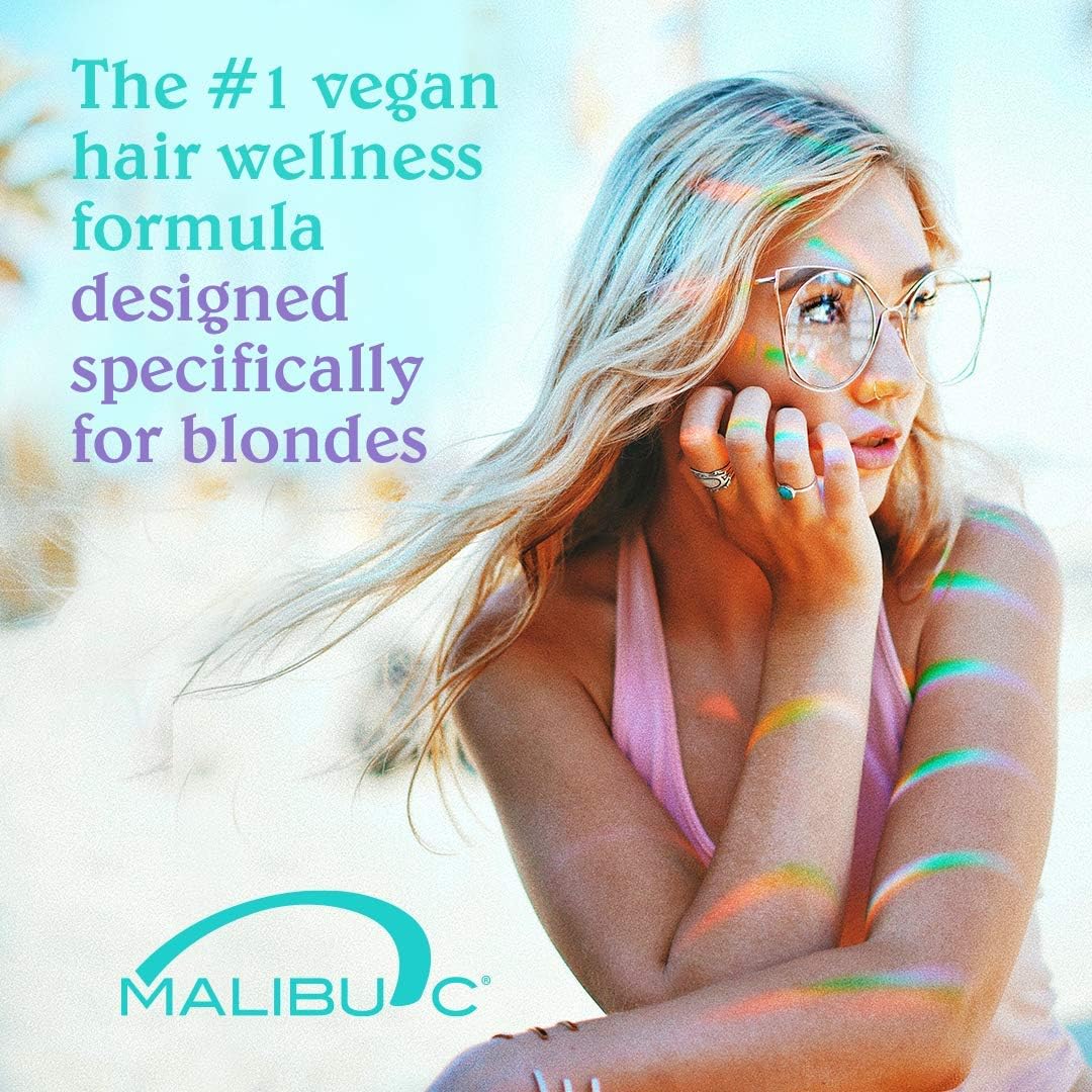Malibu C Blondes Conditioner bottle pouring to lock in moisture and softness.