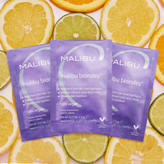 Malibu C crystals dissolving in water for easy mixing.