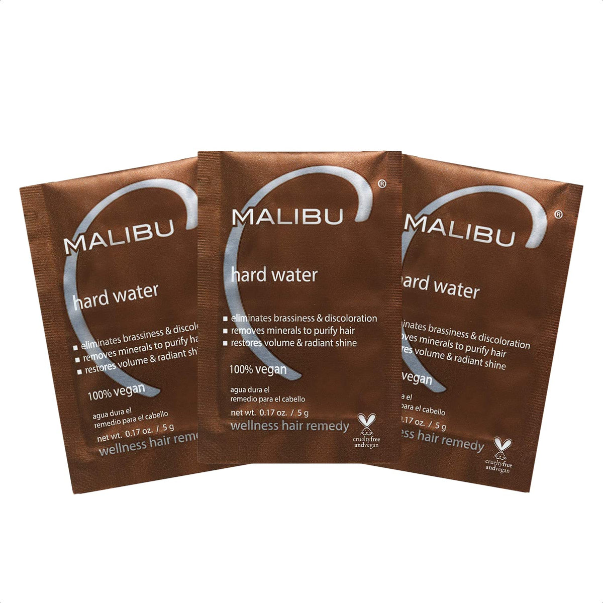 Malibu C Hard Water Wellness Remedy packets closeup for gentle detox and shine boost.