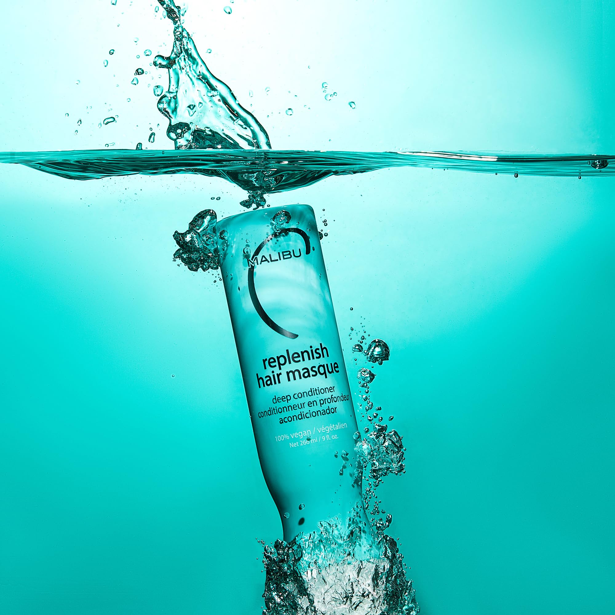 Malibu C Replenish Hair Masque wrapped in towel demonstrates convenient at-home conditioning.