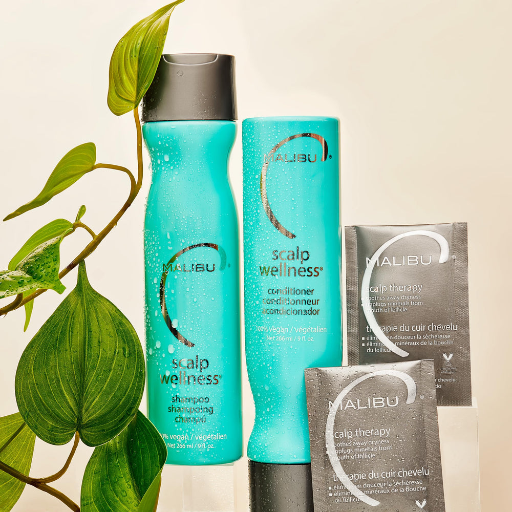 Malibu C Scalp Wellness Conditioner bottle pump delivering nourishing moisture for dry scalp.