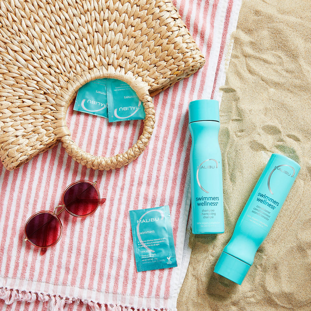 Malibu C Swimmers Wellness Shampoo 64oz packaging communicates value for families.