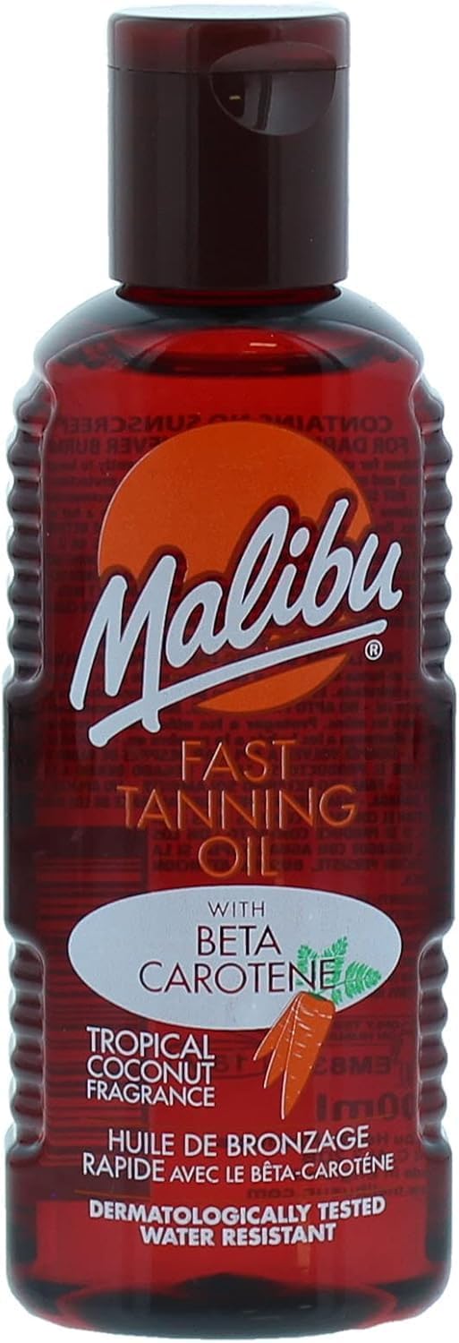 Malibu Sun Fast Tanning Oil bottle close-up for boosting bronzed glow outdoors.