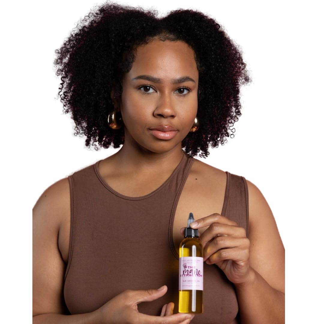 The Mane Attraction Hair Oil scalp massage image shows soothing application for itchy dry scalps.