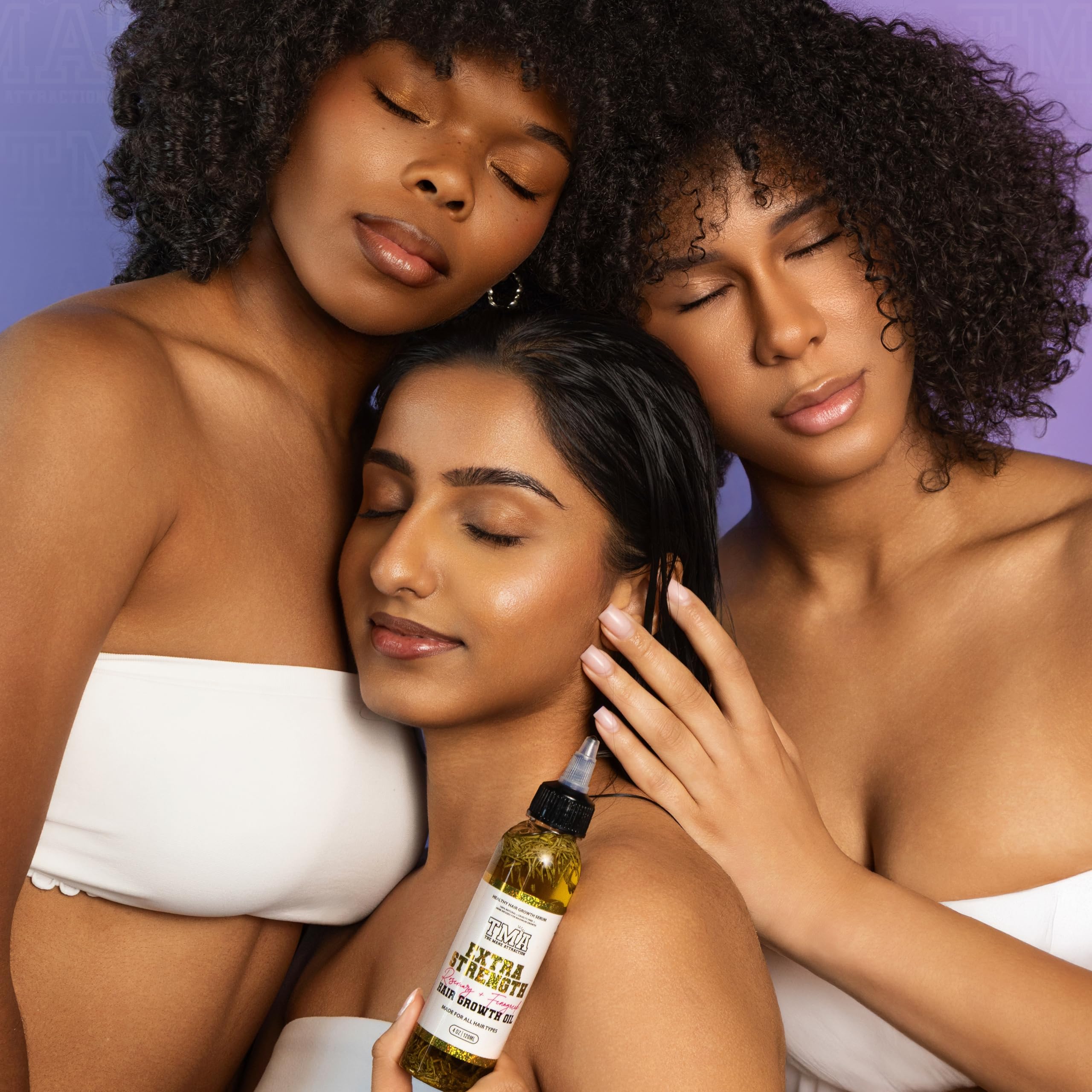 The Mane Attraction rosemary peppermint oil close-up highlights invigorating, refreshing scalp care.
