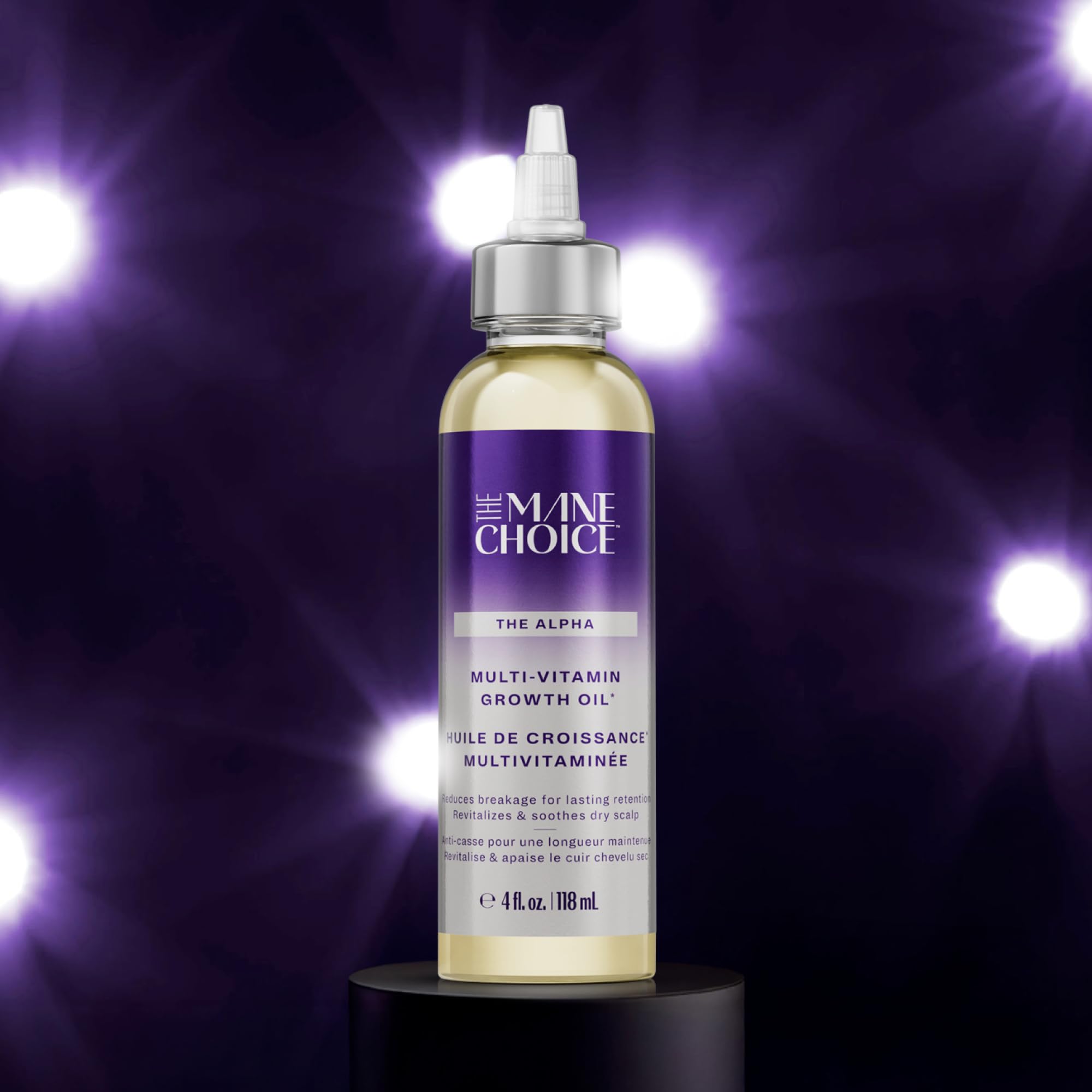 Lightweight, non-greasy texture of Alpha Multi-Vitamin Scalp Oil on hair.