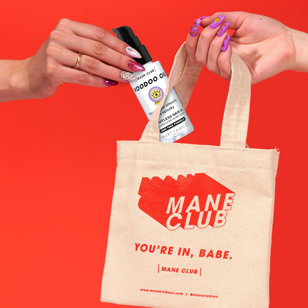 MANE CLUB VOODOO OIL bottle pour demonstrates weightless shine for all hair types