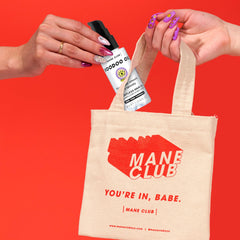 MANE CLUB VOODOO OIL bottle pour demonstrates weightless shine for all hair types