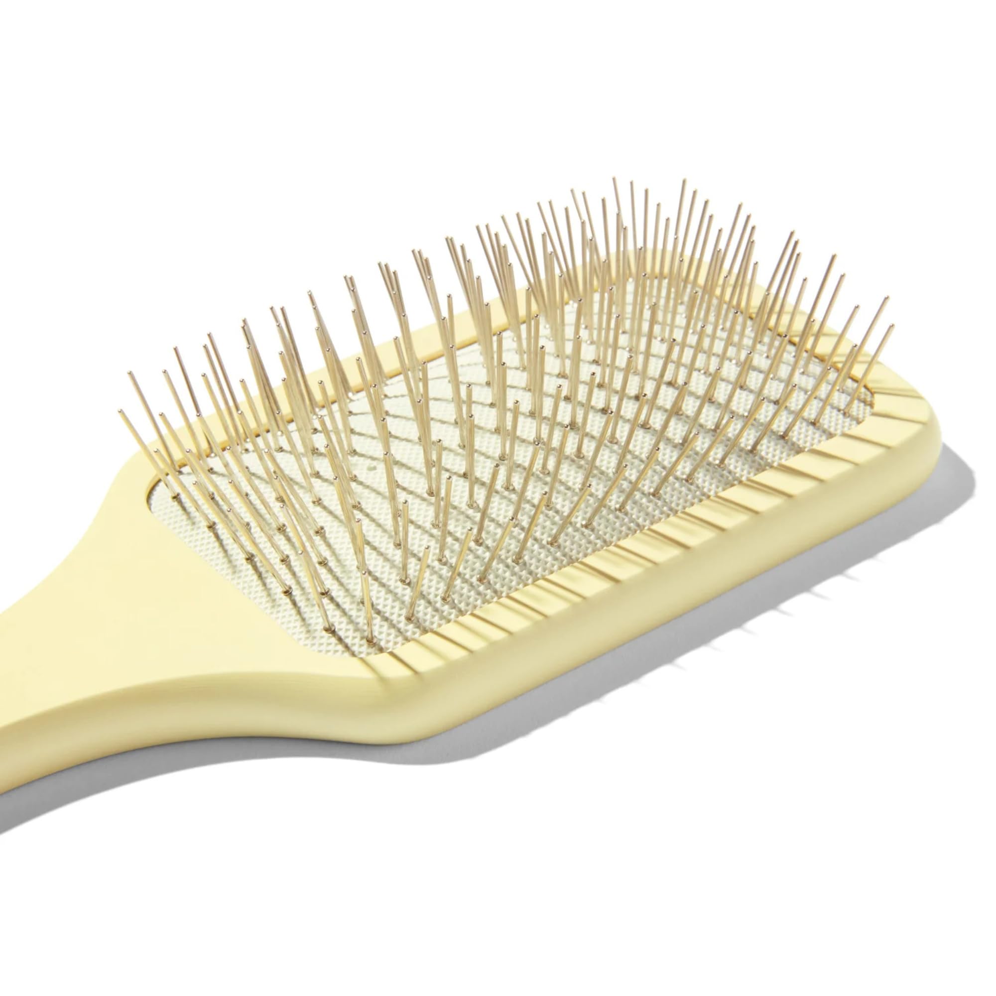 Mane Ready or Knot brush in use with scalp massage during brushing