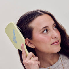 Mane Ready or Knot brush on straight hair for quick detangling and smooth finish