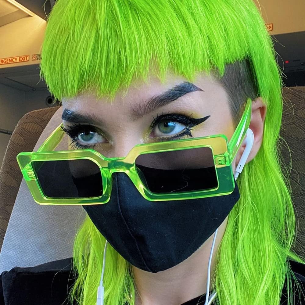 MANIC PANIC Electric Lizard under-black-light glow illustrates vibrant stage-ready color