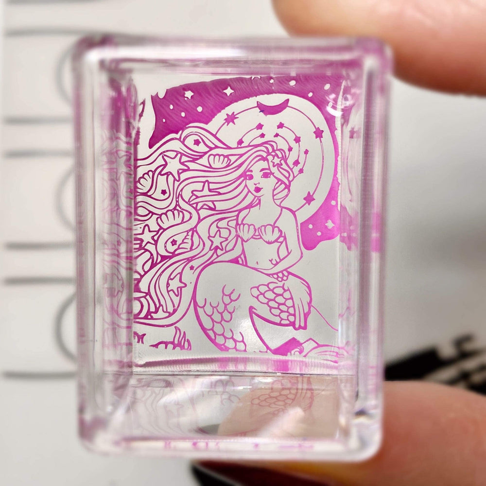 Maniology Ice Cube stamper in-use shows precise placement on nails.