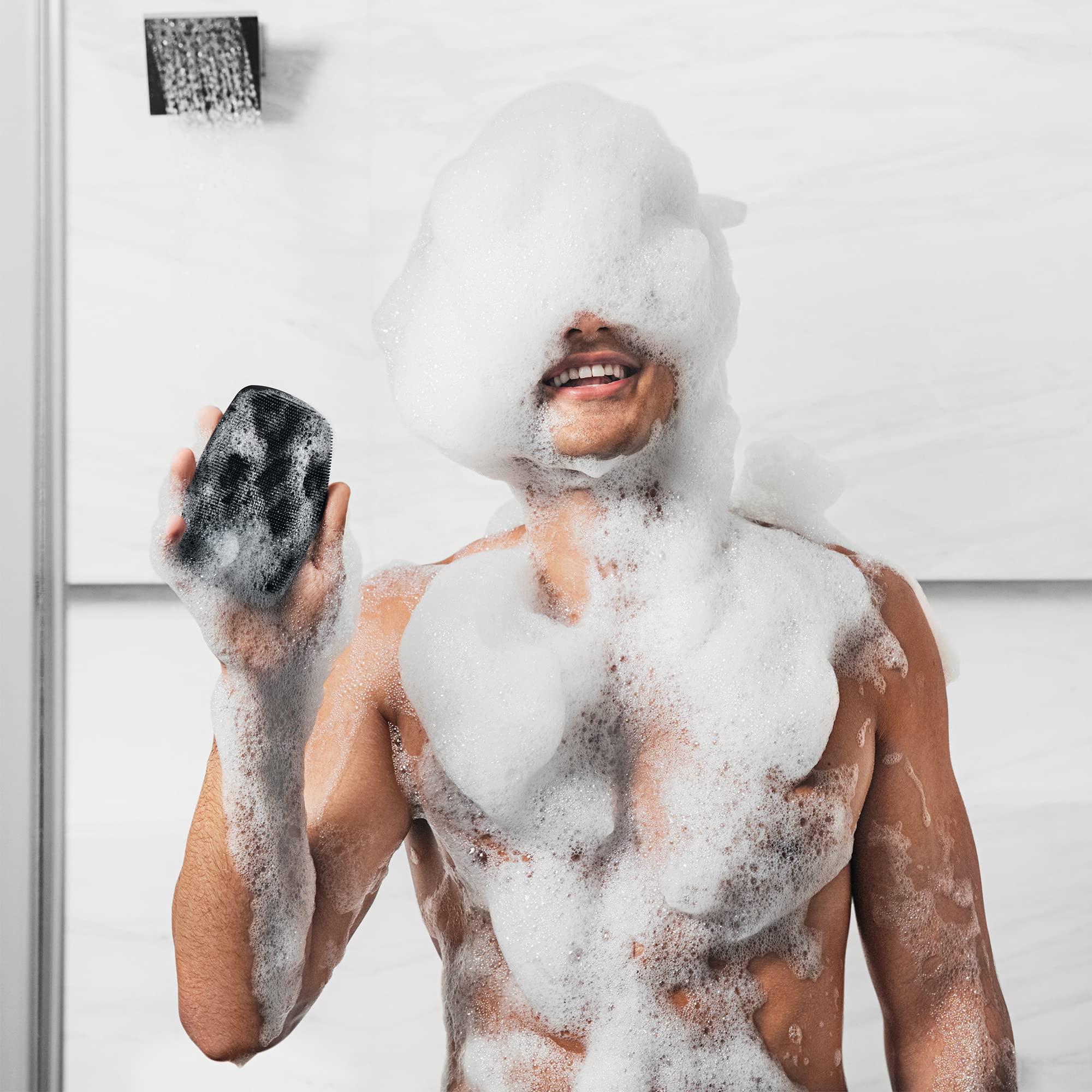 MANSCAPED The Body Buffer lather-demo shows generous foam for thorough cleansing.