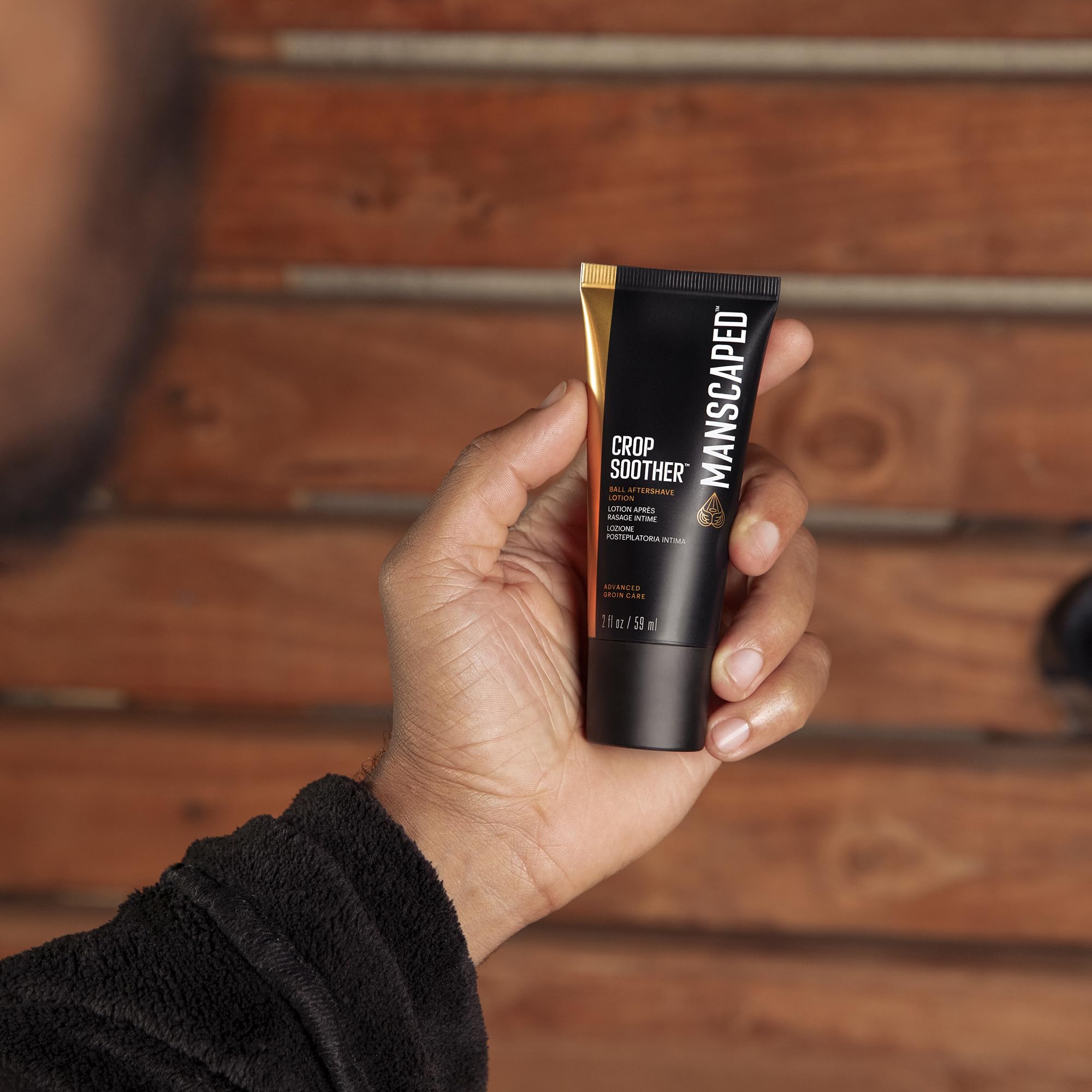 Application of MANSCAPED Crop Soother lotion in hand.