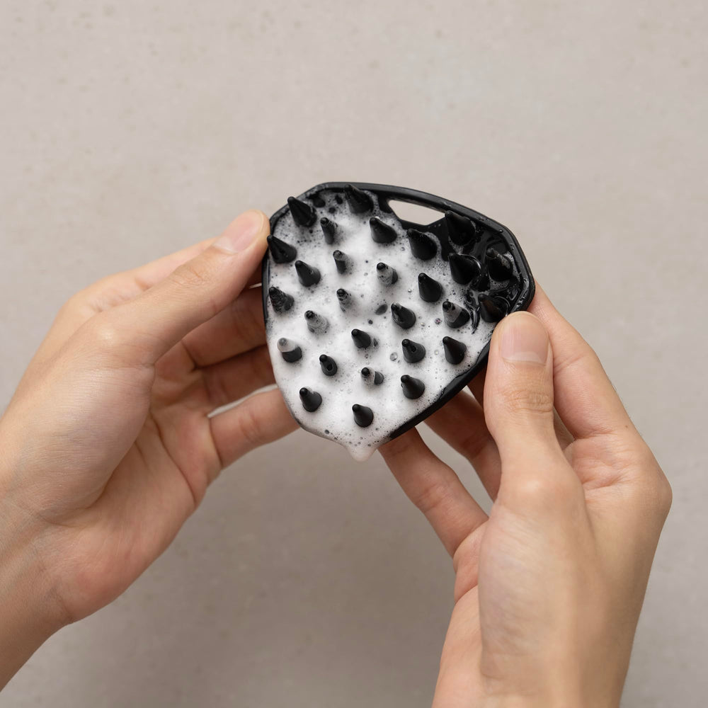 MANSCAPED Scalp Buffer compact design ideal for travel and gym bags.