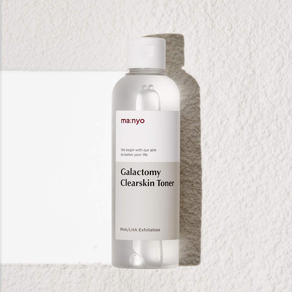 Manyo Galactomy Clear Skin Toner applied on cotton pad for refreshing cleanse.