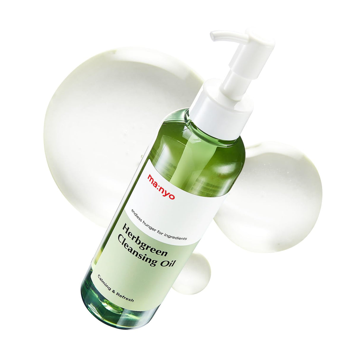 MANYO Herb Green Cleansing Oil bottle close-up showing gentle plant-based cleansing for all skin types