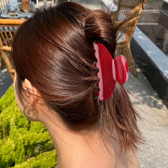 Maorulu hair bun half-up style idea shows versatile updo options.