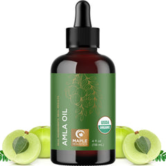 Maple Holistics Amla Oil bottle pour highlights scalp nourishment and shine.