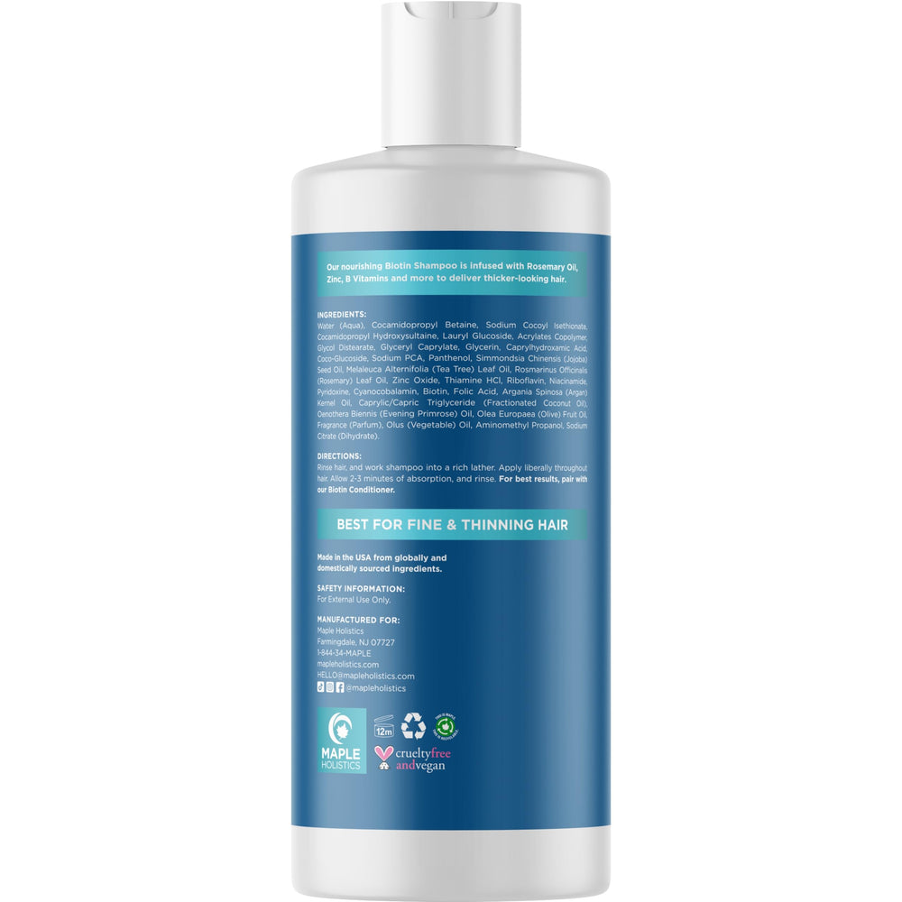 Maple Holistics tea tree essential oil image suggests refreshing scalp care during wash
