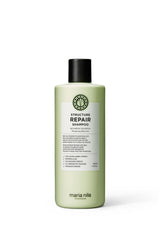 Maria Nila Structure Repair shampoo bottle close-up for gentle cleansing of damaged hair.