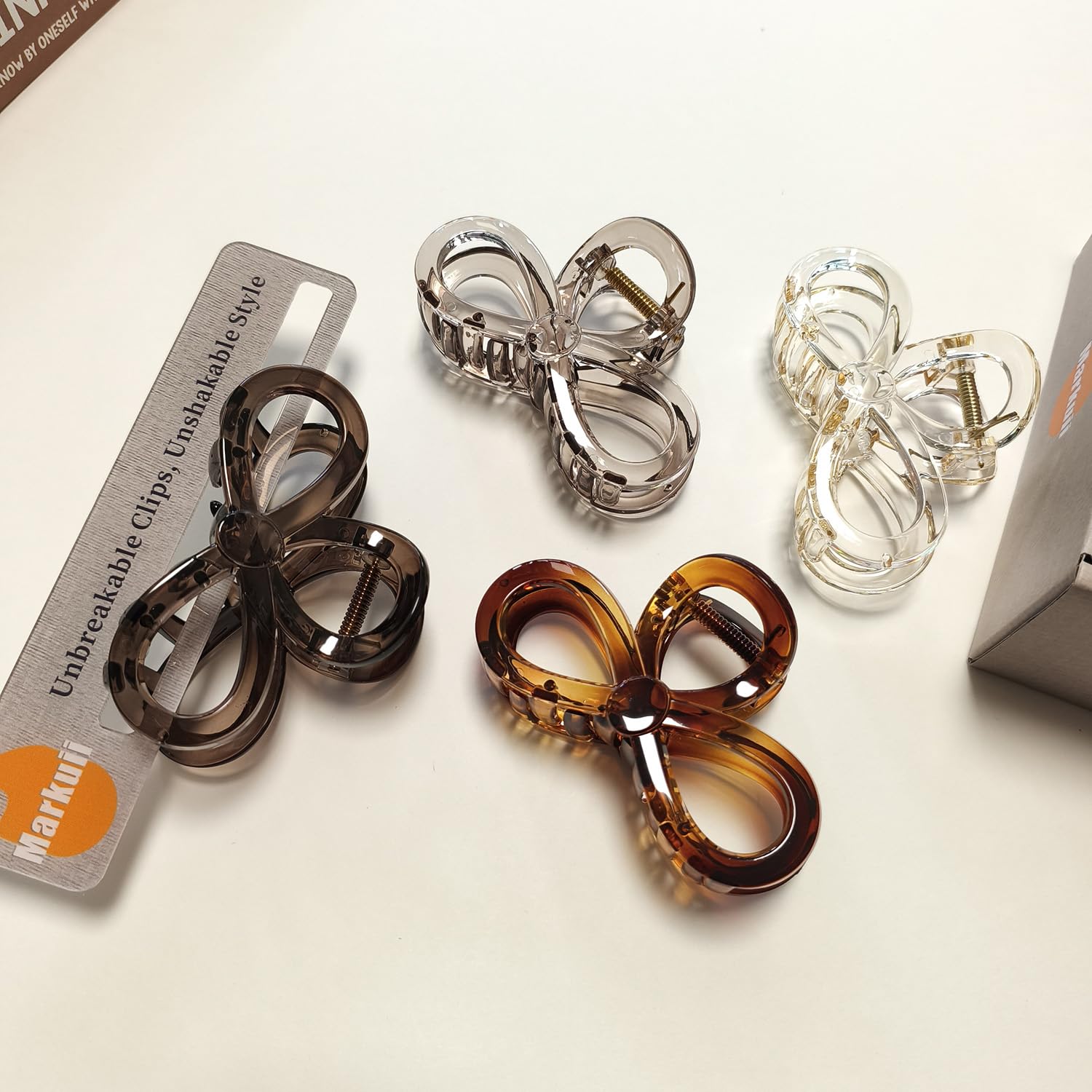 Markuii neutral glossy colors complement any hair tone and outfit