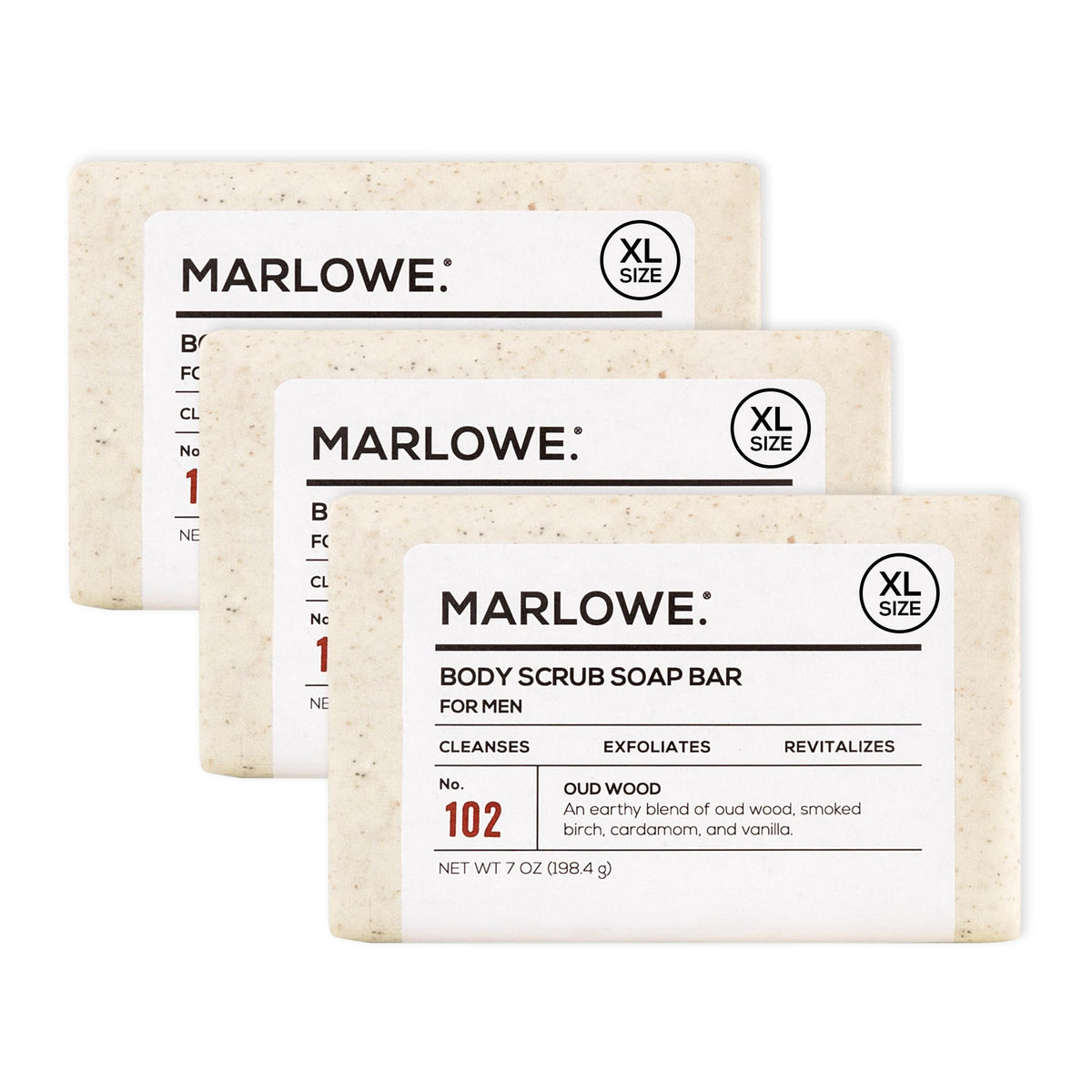 MARLOWE No. 102 Oud Wood scrub bar close-up showing gritty exfoliation for smoother skin.