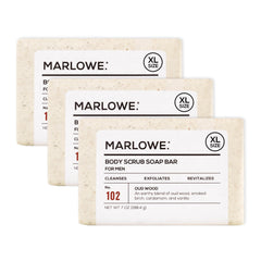 MARLOWE No. 102 Oud Wood scrub bar close-up showing gritty exfoliation for smoother skin.