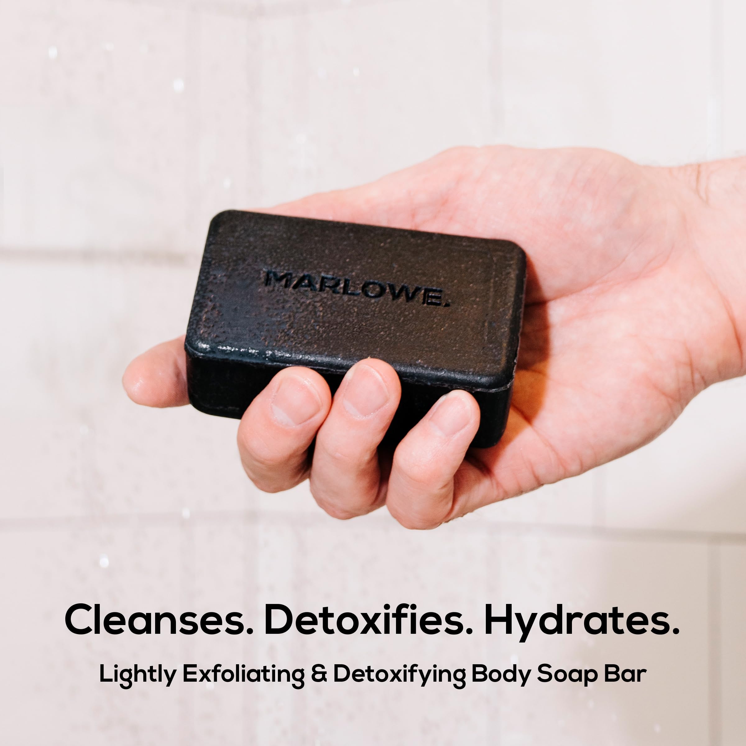 Marlowe No. 106 Charcoal Soap close-up reveals charcoal texture for deep cleanse