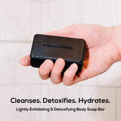 Marlowe No. 106 Charcoal Soap close-up reveals charcoal texture for deep cleanse