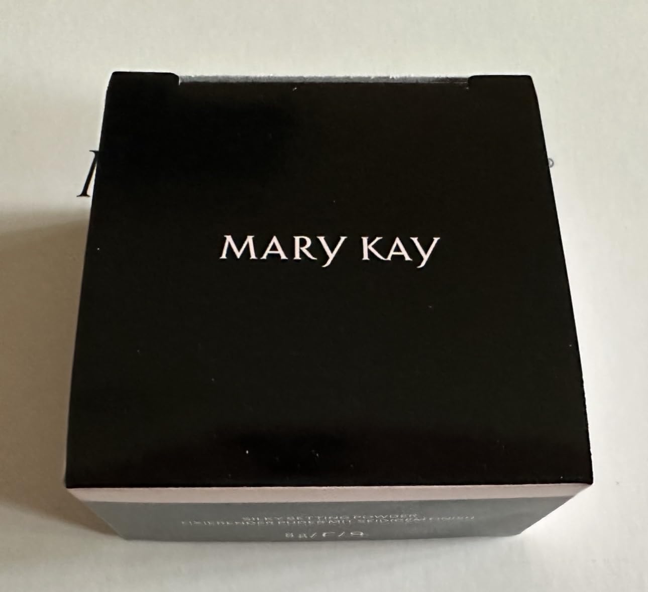 Mary Kay Silky Setting Powder applying with brush for a soft-focus, photo-ready look