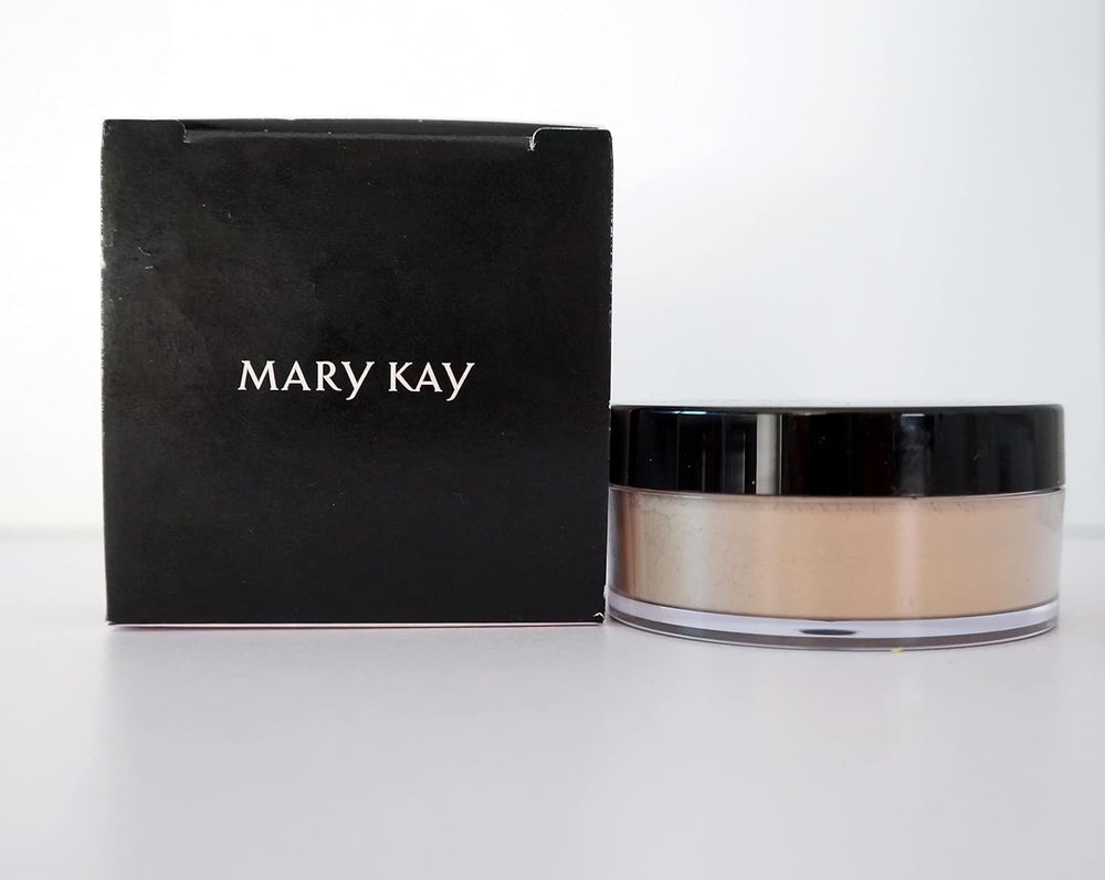 Mary Kay Silky Setting Powder bottle close-up shows silky texture for shine control