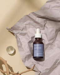 Mary&May serum face-application showing quick-absorbing texture for daytime routine.