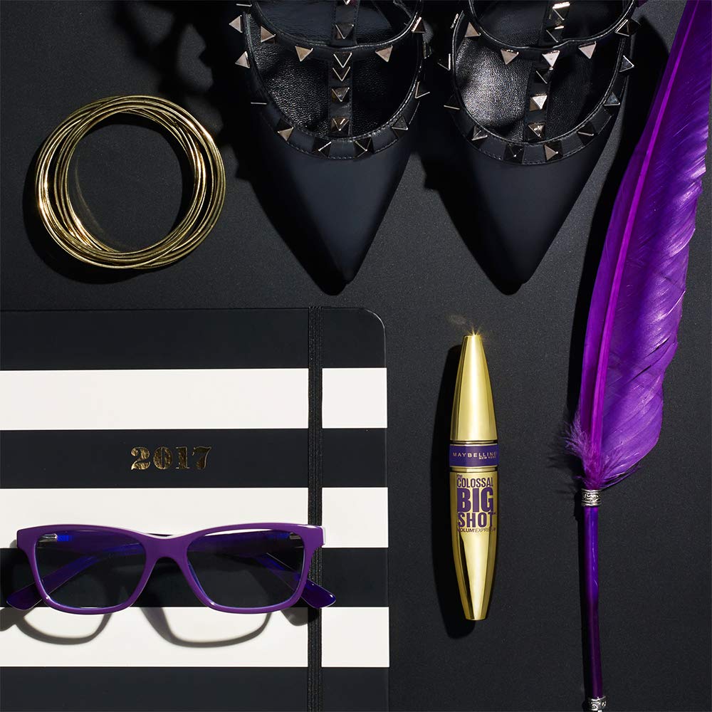 Maybelline Colossal very-black shade on lashes defines intense definition.