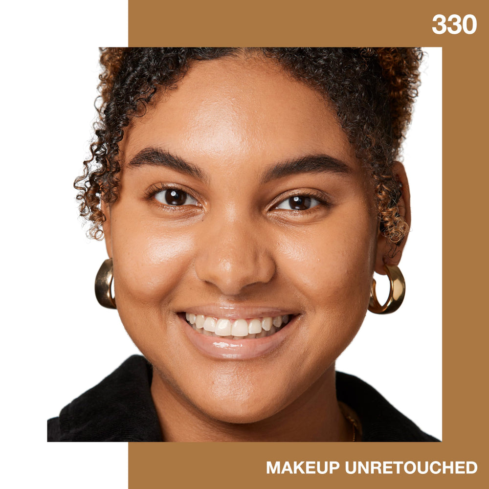 Maybelline Fit Me foundation stick close-up shows blendable texture for fingertip blending.