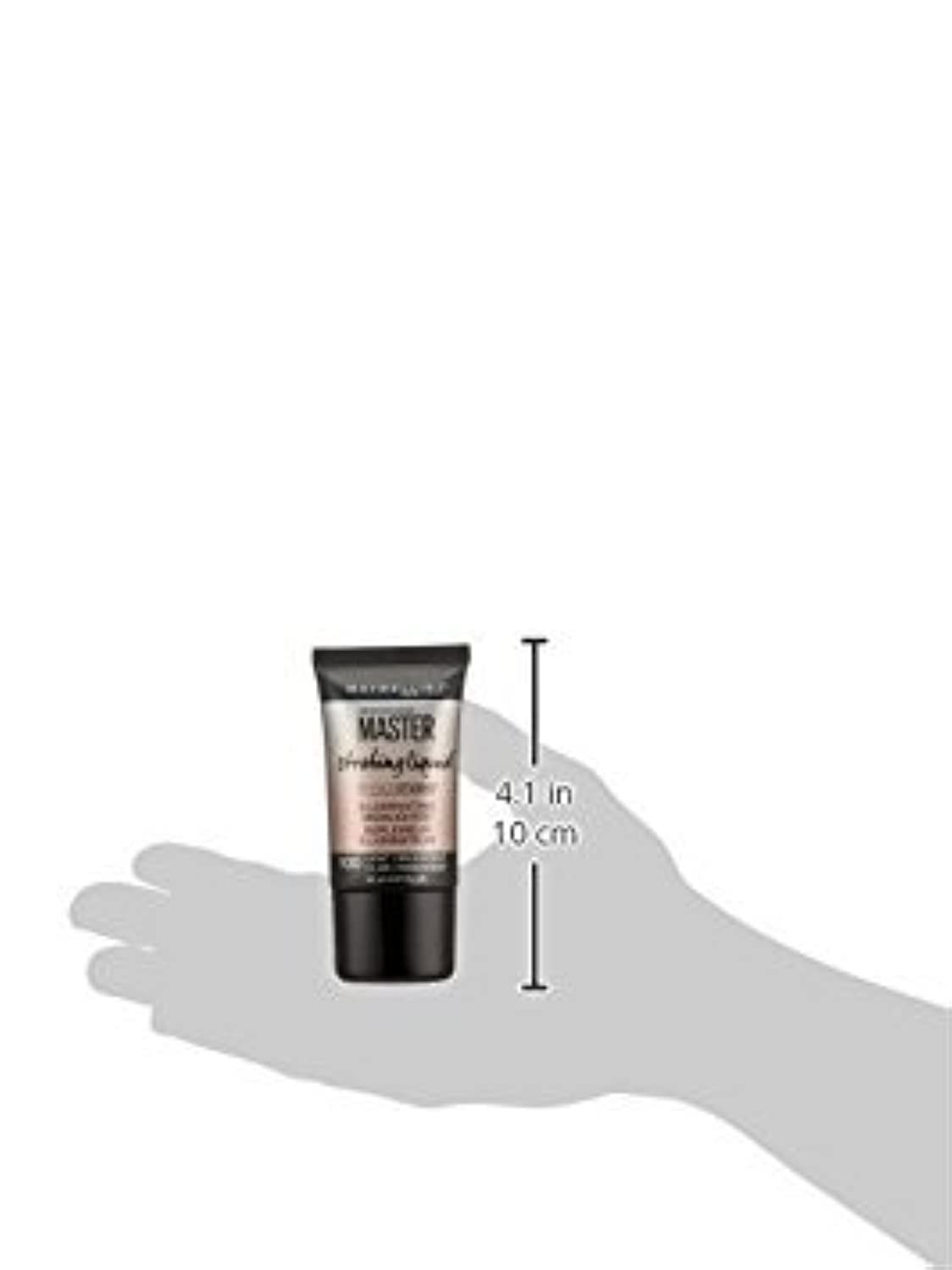 Maybelline Master Strobing Liquid Illuminator blended with fingertips for seamless glow