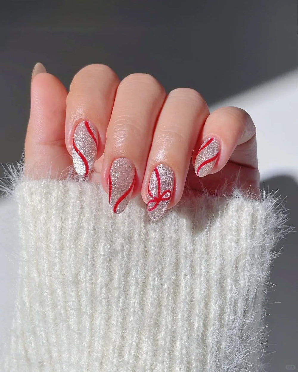 MAYCHAO Red Swirl Gel Liner for French nails enables refined line work on tips.