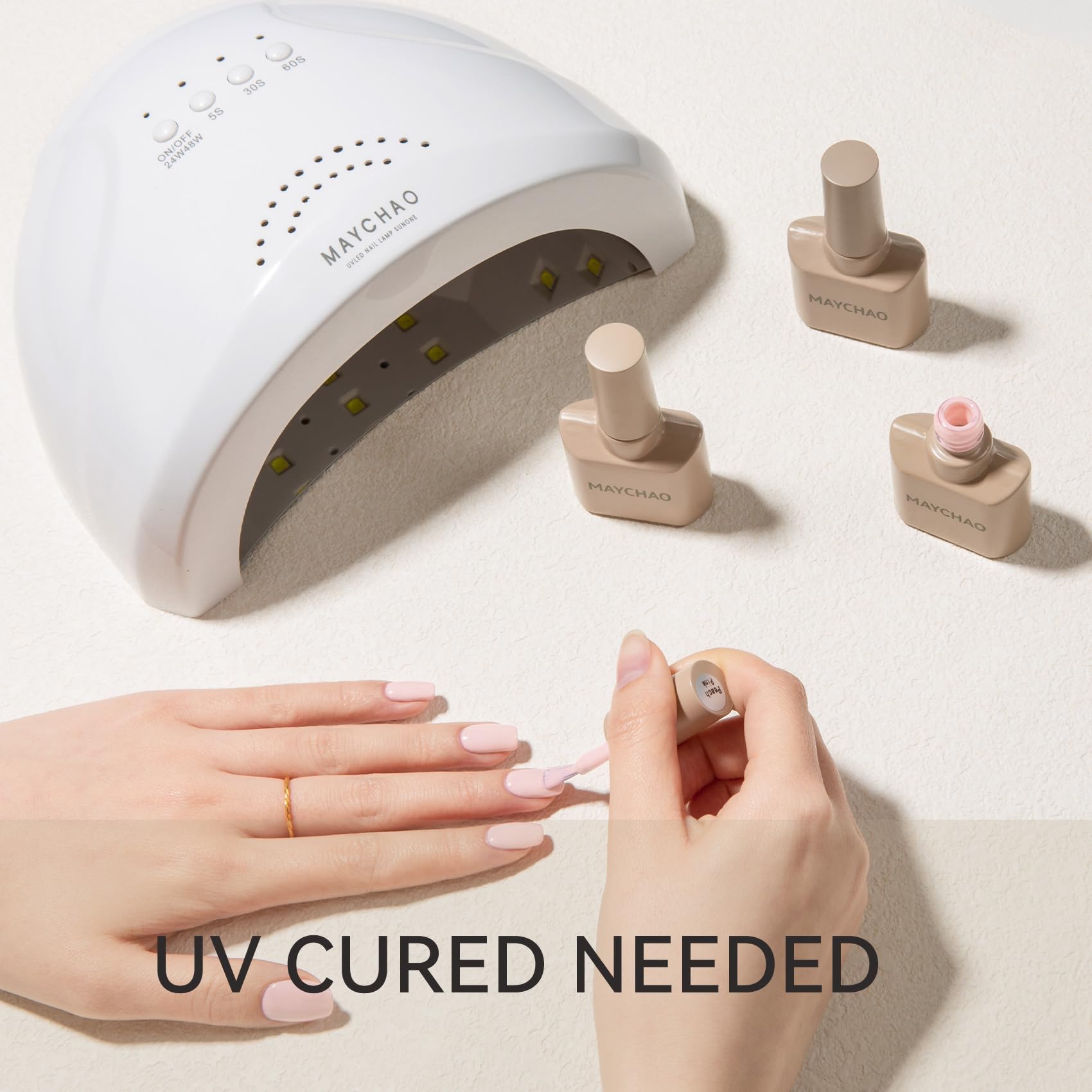 MAYCHAO Top coat cure under LED lamp for durable shine.