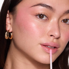 MCoBeauty Lip Lights Shine Gloss Berry Pink close-up shows juicy shine and fuller-looking lips.