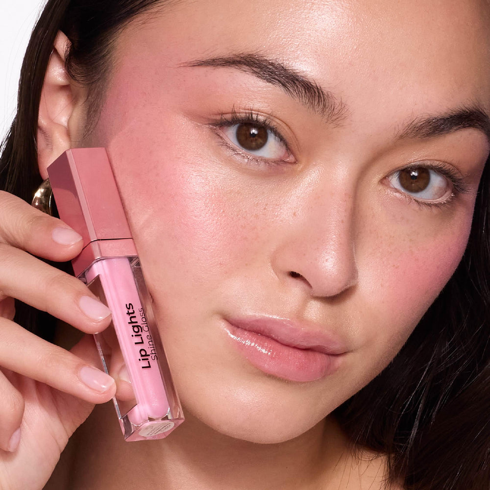 MCoBeauty Lip Lights Shine Gloss sleek packaging ideal for handbags and travel.