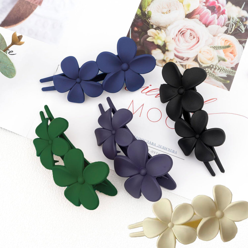 Mdscve flower flat hair clip worn in application for quick, reliable styling.