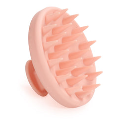 Meartchy silicone scalp massager with pale pink handle for soothing, spa-like scalp massages.