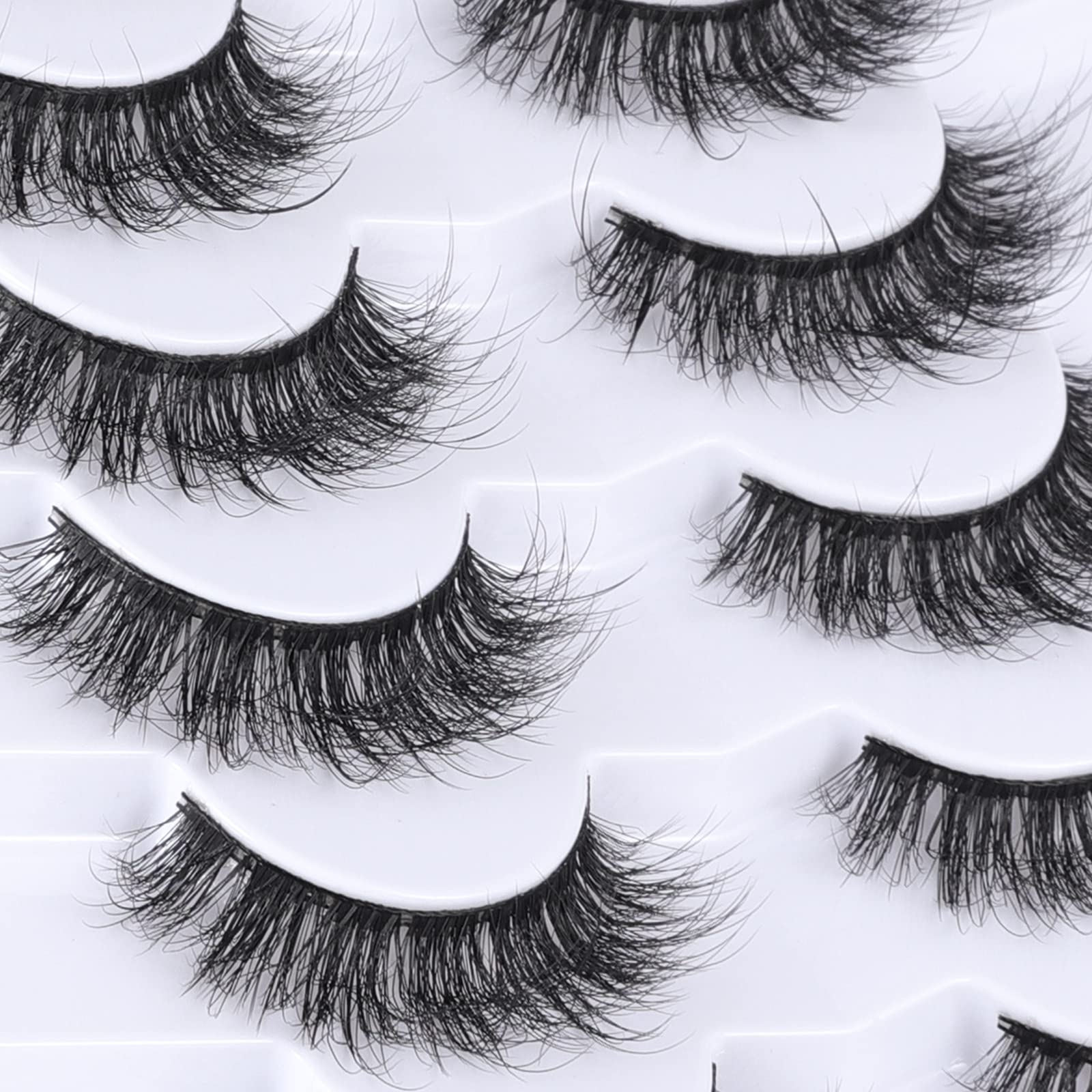 Mebver wispy lashes display subtle volume for a natural glamour look.