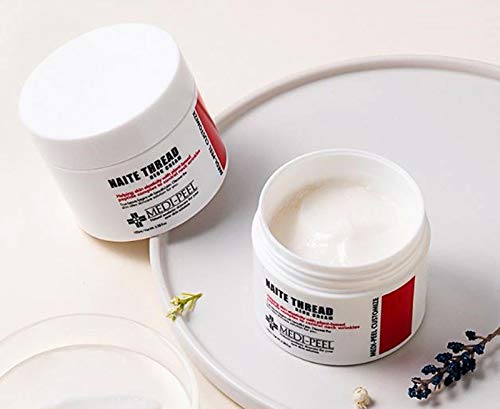 MEDI-PEEL Naite Thread Neck Cream jar closeup shows rich texture for targeted neck care.